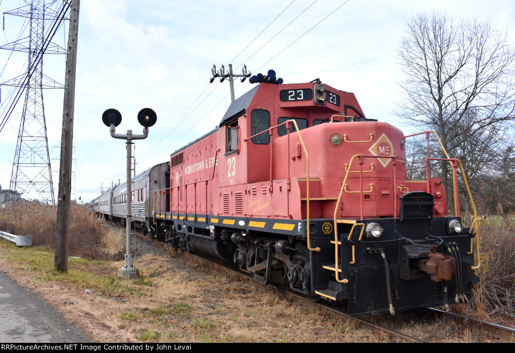 The 23 pushes the train away from Ridgedale Avenue Grade Crossing in East Hanover toward Whippany